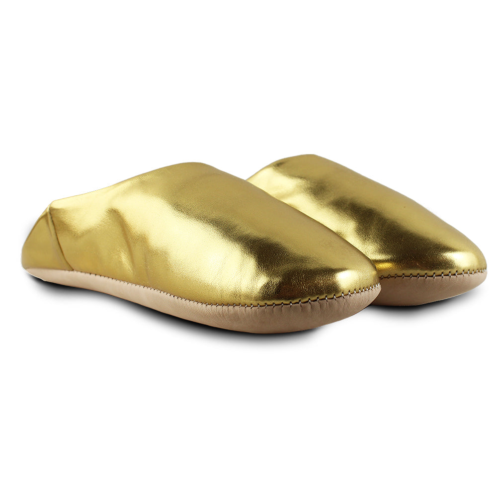 Zapatilla efecto dorado